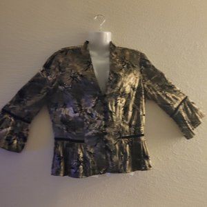Size 12  blouse in gold color with black lining and small black piping on blouse
